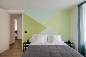 En eller flere senge i et værelse på Ancona Center - Mazzini 73