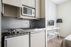 Kuchyňa alebo kuchynka v ubytovaní Residencia Universitaria Resa Blas De Otero