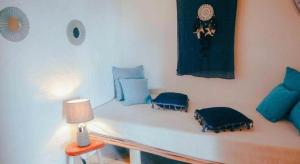 Postel nebo postele na pokoji v ubytování BambooJam Villa