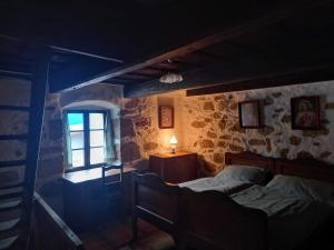 En eller flere senge i et værelse på Kamenný dom