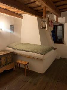 En eller flere senge i et værelse på Kamenný dom