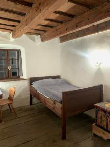 En eller flere senge i et værelse på Kamenný dom