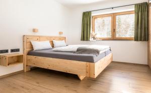 Postel nebo postele na pokoji v ubytování Ferienwohnungen Fiechtl