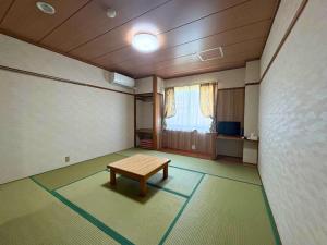 Et tv og/eller underholdning på ホテルイブプラザ