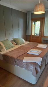 Postel nebo postele na pokoji v ubytování Zumrut Bahce + 63 fotografií