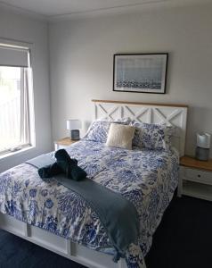 En eller flere senge i et værelse på Bay View's