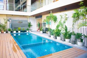 Bazén v ubytování Athiri Residence Goidhoo - Island beach holiday nebo v jeho okolí + 6 fotografií