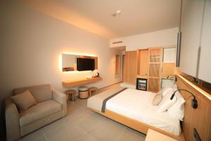 TV i/ili multimedijalni sistem u objektu Blue Inn Hotel