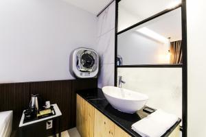 Koupelna v ubytování Hotel Cacao + 37 fotografií