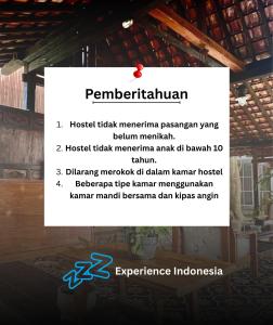 ein Schild auf der Seite eines Gebäudes in der Unterkunft Terima Kasih Malang by ZZZ in Malang