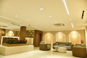 Khu vực ghế ngồi tại Hotel Opulence Kalinga