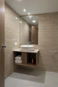 Phòng tắm tại Hotel Opulence Kalinga