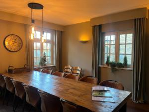 Møde- og/eller konferencelokalet på Sfeervol familielandhuis in de groene Kempen