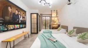 TV a/nebo společenská místnost v ubytování Banlan House