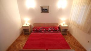 Posteľ alebo postele v izbe v ubytovaní Apartments Ivka