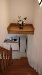 Kuchyňa alebo kuchynka v ubytovaní Apartments Ivka