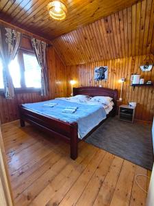 Postel nebo postele na pokoji v ubytování Apartmani Božana Vojinović