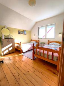 Postel nebo postele na pokoji v ubytování Apartmani Božana Vojinović