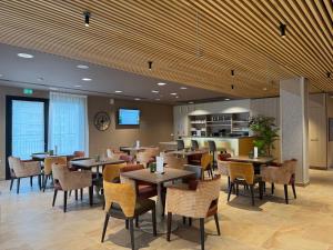 En restaurant eller et andet spisested på DOMITYS - L'échiquier