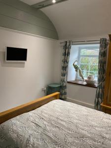 En eller flere senge i et værelse på The chapel