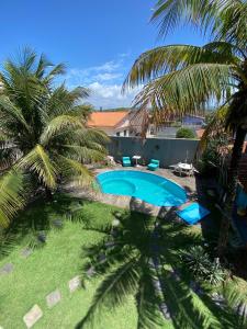 Swimmingpoolen hos eller tæt på Casa de Praia Suítes