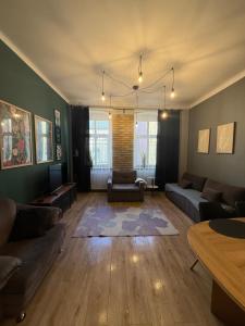 Et opholdsområde på Centrum Kupiecka Apartment