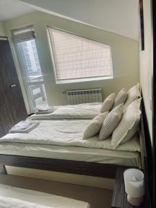 Postel nebo postele na pokoji v ubytování Snow Forest