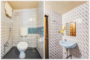 ein Badezimmer mit Toilette und Waschbecken in der Unterkunft Hotel O Arambol Beach Formerly Hakuna Matata in Arambol