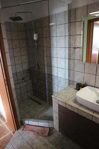 a bathroom with a shower and a sink at Villa Elea in Milies Pelion in Mileai +33 photos