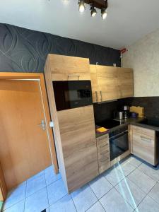 Nhà bếp/bếp nhỏ tại Gemütliche Ferienwohnung in der Lüneburger Heide