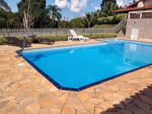 Swimmingpoolen hos eller tæt på Quarto chácara