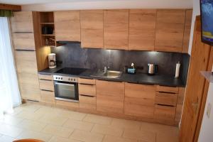 Nhà bếp/bếp nhỏ tại Apart Gertrud