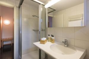 Koupelna v ubytování Blümlisalp + 27 fotografií