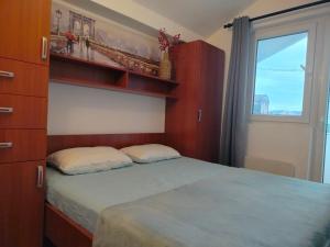 En eller flere senge i et værelse på Udoban dvosoban stan 450 metara od mora