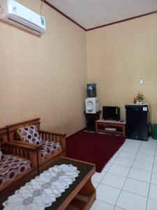 TV a/nebo společenská místnost v ubytování Homestay D'ilham Pantai Madasari