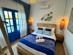 En eller flere senge i et værelse på Casa Bella Khaolak + 163 billeder