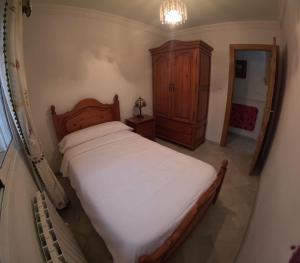 En eller flere senge i et værelse på VillaFilomena + 35 billeder