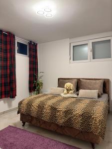 En eller flere senge i et værelse på Atina Premium