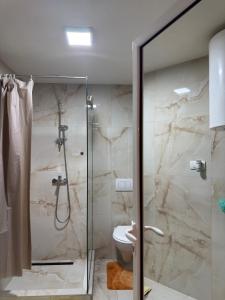 Et badeværelse på Atina Premium