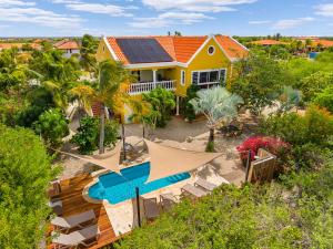 an aerial view of a house with a solar roof at Maravia Bonaire in Kralendijk
