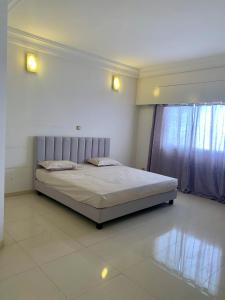 เตียงในห้องที่ Tergane Appartement Premium