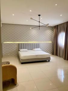 เตียงในห้องที่ Tergane Appartement Premium