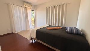 En eller flere senge i et værelse på Casa Shanti Coliving 3