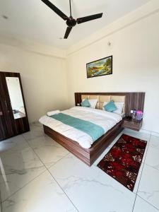 Postel nebo postele na pokoji v ubytování Hotel lucky guest house