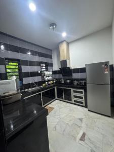 Køkken eller tekøkken på Bungalow Pool Villa