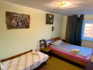 En eller flere senge i et værelse på K84, Nice 2- bedroom apartment - 2 big beds 1 single bed