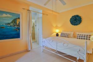 Postel nebo postele na pokoji v ubytování Apricot Gardens Guesthouse + 73 fotografií