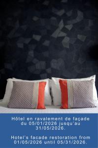 Giường trong phòng chung tại Hotel France Albion