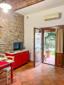 TV a/nebo společenská místnost v ubytování Agriturismo Il Cuscino Nel Pagliaio