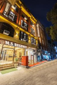 a building with a ms frequency sign in front of it at Hotel MSRegency At Karol Bagh in New Delhi